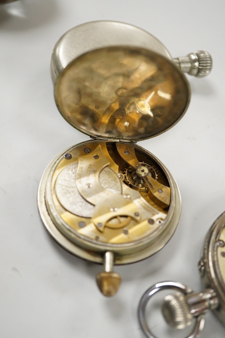An erotic globe watch, a base metal open faced 8 day keyless pocket watch and two car dashboard clocks including Glo-Worm, largest case diameter 66mm.